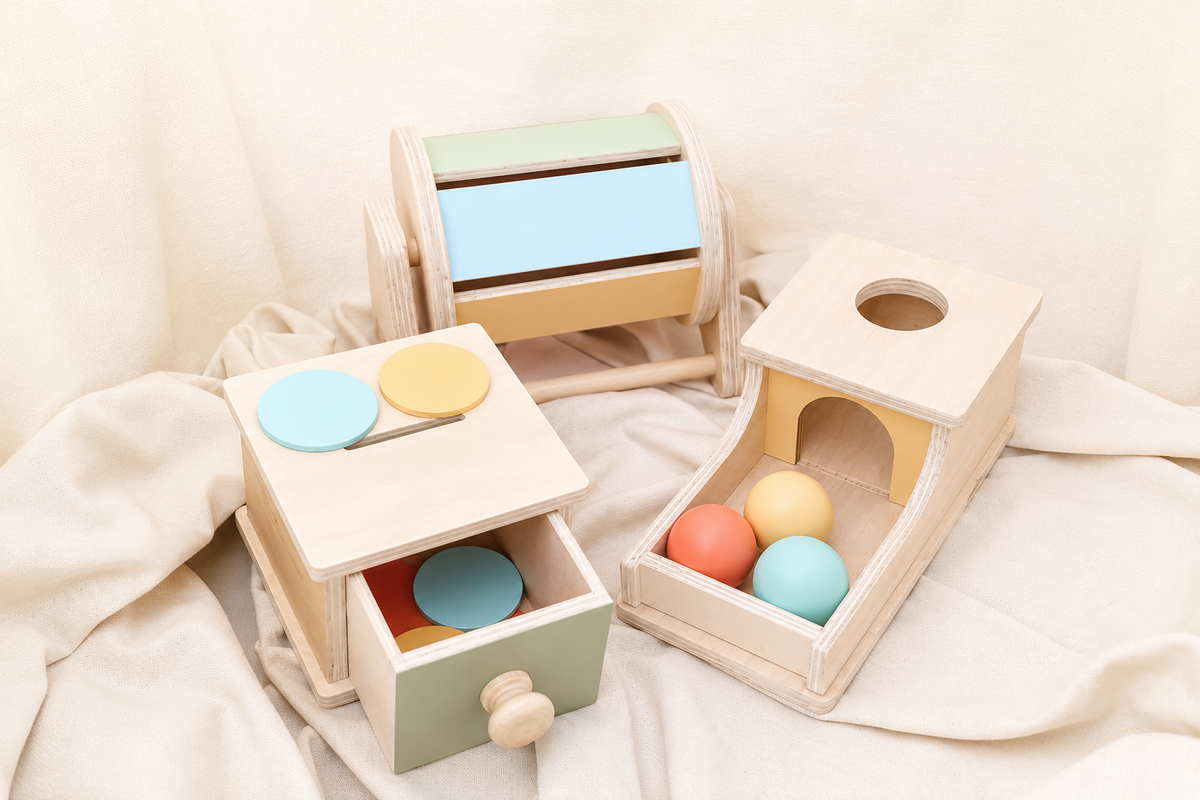 Set of wooden toys with colorful shapes on a soft fabric background