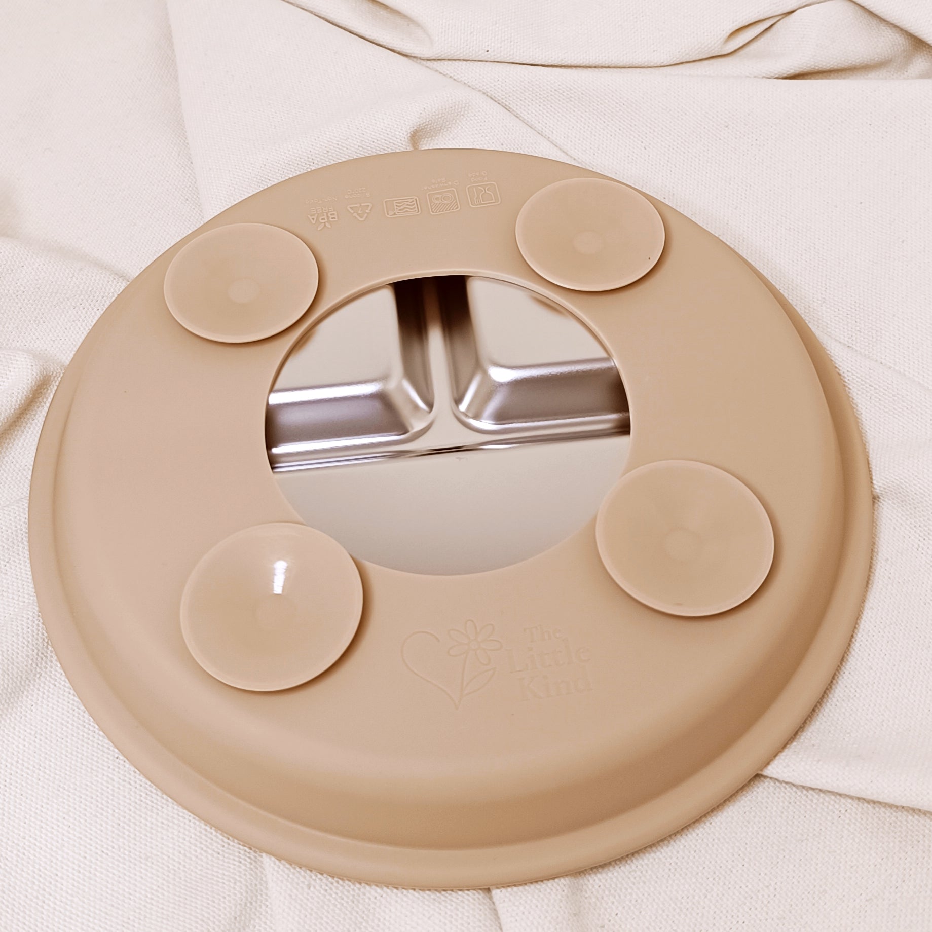 Beige silicone suction plate beige background
